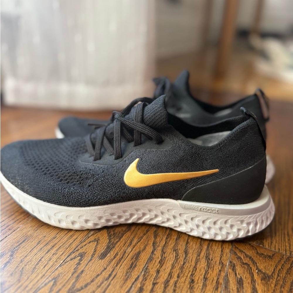 Nike Black flyknit and Gold Athletic Sneakers